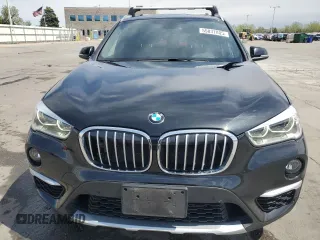 2017 BMW X1 xDrive28i with VIN WBXHT3Z38H4A58005, listed as a Copart auction lot 55837805 with 50,318 mi miles and Salvage title. Bid and sale history available at DreamBid. Image 5.