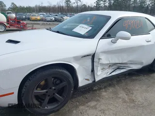 2016 Dodge Challenger SXT z VIN 2C3CDZAG6GH263508, wystawiony jako IAAI lot #41587297 z przebiegiem 119 114 mil mil oraz . Historia ofert i sprzedaży dostępna na DreamBid. Obrazek 6.