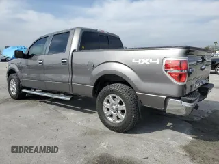 2013 Ford F-150 XL with VIN 1FTFW1EF5DFD98000, listed as a Copart auction lot 53516905 with 292,000 mi miles and Salvage title. Bid and sale history available at DreamBid. Image 2.