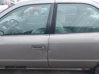 2001 Toyota Camry CE with VIN 4T1BG22K01U060588, listed as a IAAI auction lot 42040071 with 165,446 mi miles and . Bid and sale history available at DreamBid. Image 14.