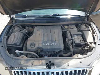 2013 Buick LaCrosse Premium 1 z VIN 1G4GF5E34DF264852, wystawiony jako IAAI lot #42272513 z przebiegiem 125 382 mil mil oraz . Historia ofert i sprzedaży dostępna na DreamBid. Obrazek 10.