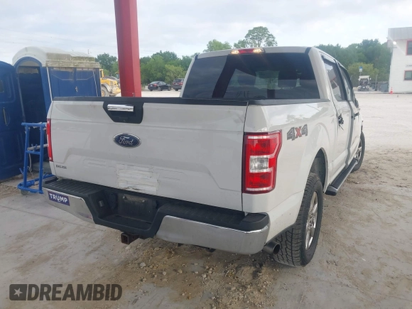 2019 Ford F-150 XL with VIN 1FTEW1E50KFA47687, listed as a IAAI auction lot 42021043 with 129,337 mi miles. Bid and sale history available at carsss.com. Image 4.