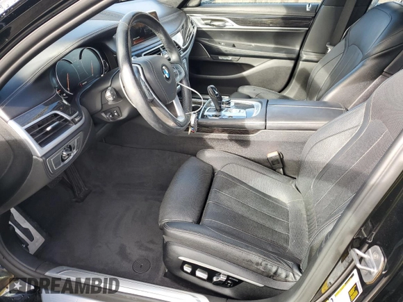 2017 BMW 7 Series 740i with VIN WBA7E2C59HG739788, listed as a Copart auction lot 48073105 with 36,274 mi miles and Salvage Title. Bid and sale history available at carsss.com. Image 7.