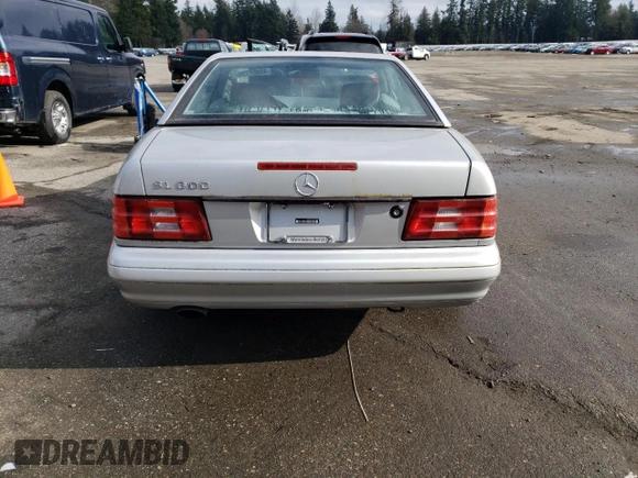 1999 Mercedes-Benz SL with VIN WDBFA76F4XF182318, listed as a Copart auction lot 45552705 with 135,447 mi miles and Clean title. Bid and sale history available at DreamBid. Image 6.