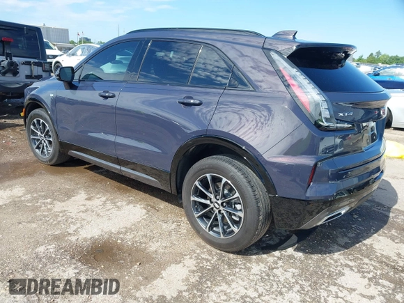 2024 Cadillac XT4 FWD Sport with VIN 1GYFZER40RF226384, listed as a IAAI auction lot 42220804 with 8,743 mi miles and . Bid and sale history available at DreamBid. Image 3.