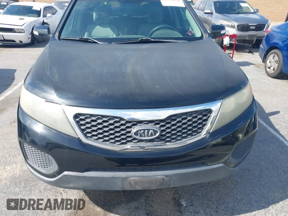 2011 Kia Sorento LX with VIN 5XYKT4A23BG055143, listed as a IAAI auction lot 42118676 with 174,268 mi miles. Bid and sale history available at carsss.com. Image 6.