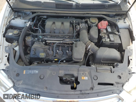 2014 Ford Taurus Limited с VIN 1FAHP2F89EG120939, выставлен на аукционе Copart как лот 59204815 с пробегом 180 105 миль миль и Списание • Salvage title. История ставок и продаж доступна на DreamBid. Изображение 11.