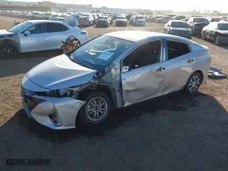 2021 Toyota Prius Prime LE with VIN JTDKAMFP1M3178179, listed as a IAAI auction lot 41233411 with 83,035 mi miles. Bid and sale history available at carsss.com. Image 18.