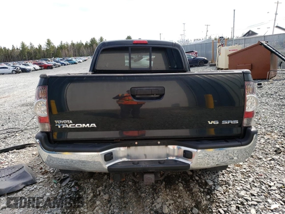 2009 Toyota Tacoma with VIN 5TEUU42N39Z660570, listed as a Copart auction lot 52025513 with 106,815 mi miles and Salvage title. Bid and sale history available at DreamBid. Image 6.