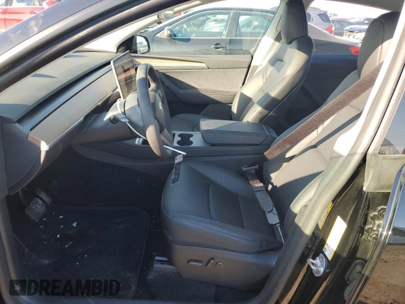 2024 Tesla Model Y Long Range with VIN 7SAYGDEE5RA270382, listed as a Copart auction lot 82899494 with 6,401 mi miles and Clean title. Bid and sale history available at DreamBid. Image 7.