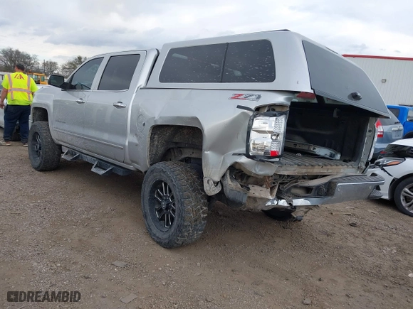 2015 Chevrolet Silverado 1500 LTZ with VIN 3GCUKSEC4FG134752, listed as a IAAI auction lot 41188074 with 154,939 mi miles. Bid and sale history available at carsss.com. Image 3.