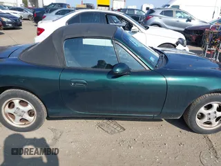 1999 Mazda MX-5 Miata with VIN JM1NB3537X0109618, listed as a IAAI auction lot 41795736 with 160,452 mi miles and . Bid and sale history available at DreamBid. Image 14.