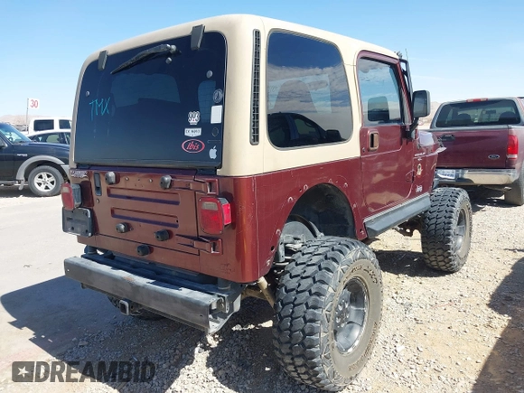 2001 Jeep Wrangler Sahara with VIN 1J4FA59S71P326941, listed as a IAAI auction lot 41648420 with 128,464 mi miles. Bid and sale history available at carsss.com. Image 4.