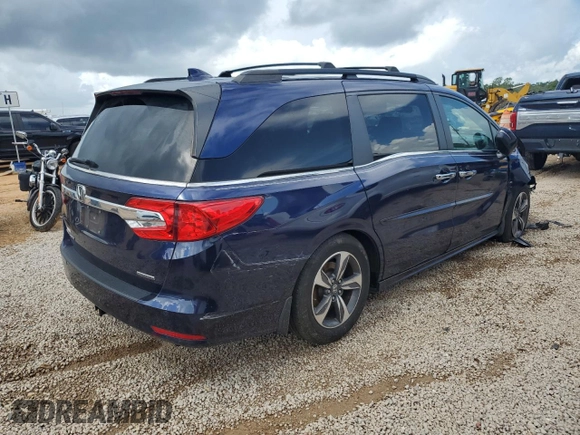 2019 Honda Odyssey Touring z VIN 5FNRL6H8XKB027156, wystawiony jako Copart lot #60735455 z przebiegiem 100 044 mil mil oraz Szkoda całkowita • Salvage title. Historia ofert i sprzedaży dostępna na DreamBid. Obrazek 3.