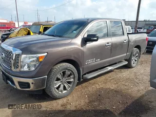 2018 Nissan Titan SV with VIN 1N6AA1E64JN502421, listed as a IAAI auction lot 40735048 with 71,256 mi miles and . Bid and sale history available at DreamBid. Image 2.