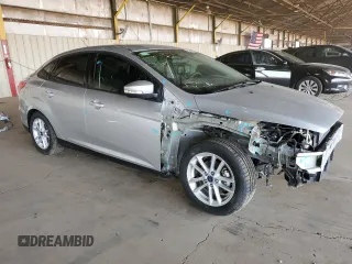 2015 Ford Focus SE with VIN 1FADP3F20FL232196, listed as a Copart auction lot 64829835 with 31,294 mi miles and Salvage title. Bid and sale history available at DreamBid. Image 4.