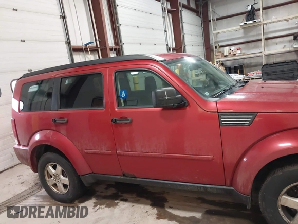 2008 Dodge Nitro SXT with VIN 1D8GU28K88W120319, listed as a IAAI auction lot 41683834 with 166,268 mi miles. Bid and sale history available at carsss.com. Image 14.