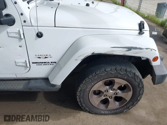 2017 Jeep Wrangler Unlimited Sahara with VIN 1C4HJWEG0HL595144, listed as a IAAI auction lot 41644511 with 143,512 mi miles. Bid and sale history available at carsss.com. Image 6.