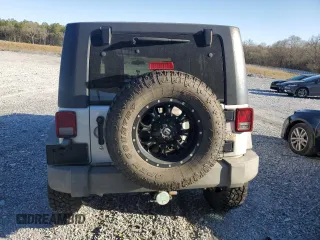 2009 Jeep Wrangler Unlimited X with VIN 1J4GA39179L756228, listed as a Copart auction lot 50086445 with 158,274 mi miles and Salvage Title. Bid and sale history available at carsss.com. Image 6.