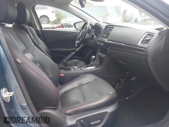 2014 Mazda 6 i Grand Touring with VIN JM1GJ1W64E1133729, listed as a IAAI auction lot 42050222 with 112,464 mi miles and . Bid and sale history available at DreamBid. Image 5.