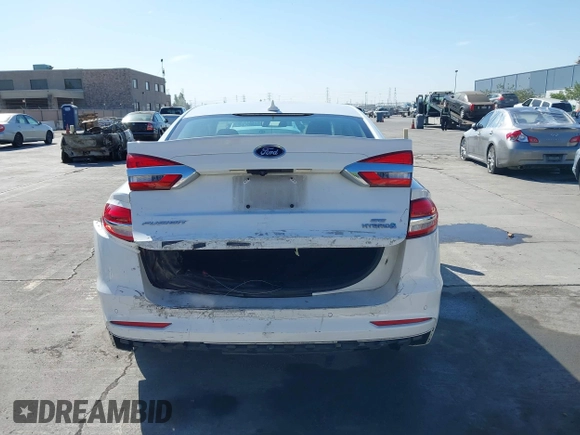 2019 Ford Fusion Hybrid SE with VIN 3FA6P0LU9KR207824, listed as a IAAI auction lot 42153330 with 69,966 mi miles. Bid and sale history available at carsss.com. Image 16.