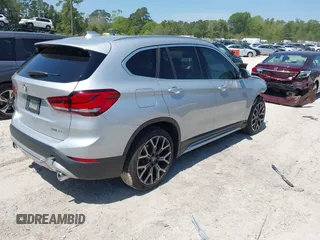 2021 BMW X1 sDrive28i with VIN WBXJG7C06M5T14235, listed as a IAAI auction lot 42021762 with 53,384 mi miles and . Bid and sale history available at DreamBid. Image 4.
