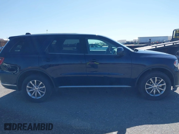 2016 Dodge Durango Special Service with VIN 1C4SDJFT3GC456023, listed as a IAAI auction lot 41976356 with 128,004 mi miles and . Bid and sale history available at carsss.com. Image 13.