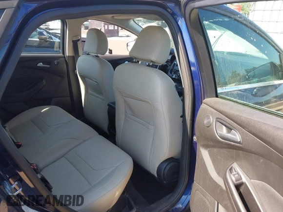 2016 Ford Focus Titanium with VIN 1FADP3N23GL231613, listed as a IAAI auction lot 42645683 with 76,072 mi miles and . Bid and sale history available at DreamBid. Image 8.
