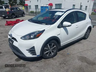 2018 Toyota Prius One with VIN JTDKDTB33J1613019, listed as a IAAI auction lot 42063768 with 59,143 mi miles and . Bid and sale history available at DreamBid. Image 17.