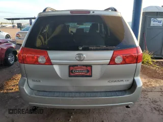 2010 Toyota Sienna CE with VIN 5TDKK4CC6AS329753, listed as a Copart auction lot 54374515 with 144,654 mi miles and Salvage Title. Bid and sale history available at DreamBid. Image 6.