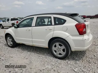 2009 Dodge Caliber SXT z VIN 1B3HB48A89D198108, wystawiony jako Copart lot #58910415 z przebiegiem 176 257 mil mil oraz Czysty tytuł • Clean title. Historia ofert i sprzedaży dostępna na DreamBid. Obrazek 2.