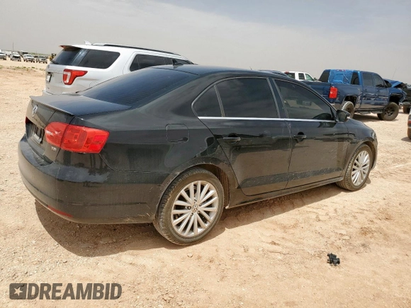 2014 Volkswagen Jetta TDI w/Premium with VIN 3VW3L7AJ2EM443384, listed as a Copart auction lot 56748125 with 137,987 mi miles and Salvage title. Bid and sale history available at DreamBid. Image 3.