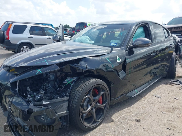 2023 Alfa Romeo Giulia Quadrifoglio with VIN ZARFAMEV9P7674979, listed as a IAAI auction lot 42514383 with 19,226 mi miles and . Bid and sale history available at DreamBid. Image 2.