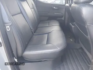 2020 Toyota Tacoma SR5 with VIN 3TMDZ5BN3LM080702, listed as a IAAI auction lot 42463811 with 70,185 mi miles and . Bid and sale history available at DreamBid. Image 8.