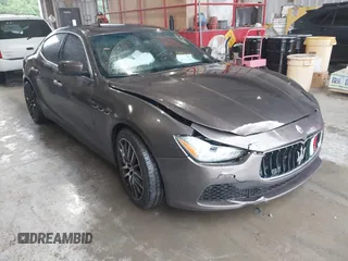 2015 Maserati Ghibli S Q4 z VIN ZAM57RTA3F1146241, wystawiony jako IAAI lot #42251953 z przebiegiem 133 411 mil mil oraz . Historia ofert i sprzedaży dostępna na DreamBid. Obrazek 1.