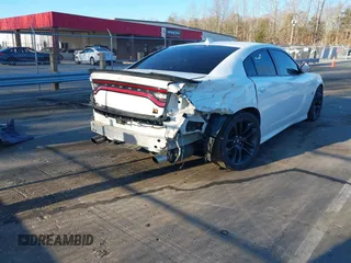 2020 Dodge Charger Scat Pack Widebody z VIN 2C3CDXGJ3LH244092, wystawiony jako IAAI lot #41828294 z przebiegiem 107 568 mil mil oraz . Historia ofert i sprzedaży dostępna na DreamBid. Obrazek 4.
