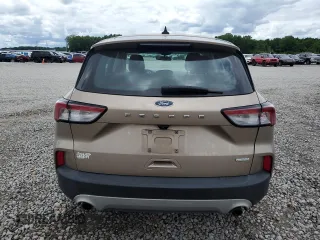 2020 Ford Escape S with VIN 1FMCU0F66LUB57604, listed as a Copart auction lot 58354665 with 58,871 mi miles and Salvage title. Bid and sale history available at DreamBid. Image 6.