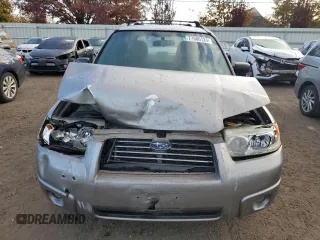 2007 Subaru Forester X with VIN JF1SG63617H746062, listed as a Copart auction lot 77686124 with 200,055 mi miles and Salvage Title. Bid and sale history available at carsss.com. Image 5.