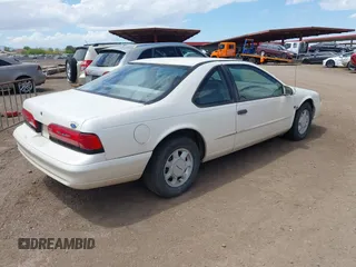 1995 Ford Thunderbird LX with VIN 1FALP62W1SH168074, listed as a IAAI auction lot 41995575 with 232,742 mi miles. Bid and sale history available at carsss.com. Image 4.