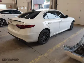 2017 Alfa Romeo Giulia with VIN ZARFAEDN1H7552738, listed as a IAAI auction lot 41529238 with 107,421 mi miles. Bid and sale history available at carsss.com. Image 4.