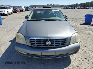 2003 Cadillac DeVille DTS z VIN 1G6KF579X3U233215, wystawiony jako Copart lot #48636775 z przebiegiem 99 144 mil mil oraz Nie do naprawy. Historia ofert i sprzedaży dostępna na DreamBid. Obrazek 5.