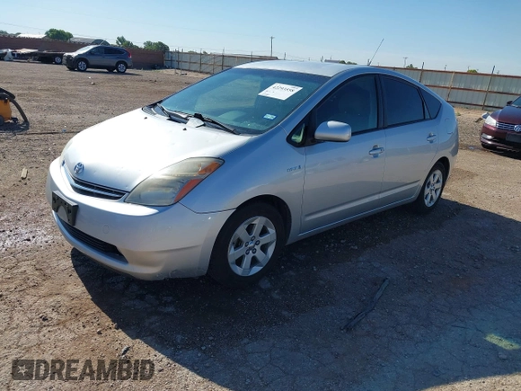 2007 Toyota Prius with VIN JTDKB20UX77658668, listed as a IAAI auction lot 42293558 with 123,007 mi miles and . Bid and sale history available at DreamBid. Image 2.