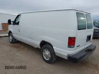 2009 Ford Econoline Cargo Commercial with VIN 1FTNE14W09DA91501, listed as a IAAI auction lot 41473298 with 99,129 mi miles and . Bid and sale history available at DreamBid. Image 3.