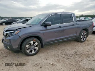 2017 Honda Ridgeline RTL with VIN 5FPYK2F55HB001824, listed as a Copart auction lot 63680045 with 84,552 mi miles and Salvage title. Bid and sale history available at DreamBid. Image 1.