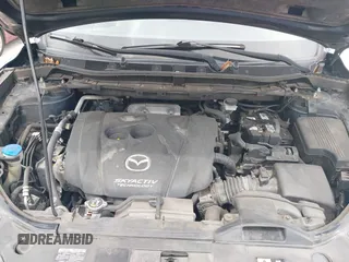 2014 Mazda CX-5 Grand Touring with VIN JM3KE2DY8E0425258, listed as a IAAI auction lot 42179452 with 132,137 mi miles. Bid and sale history available at carsss.com. Image 10.