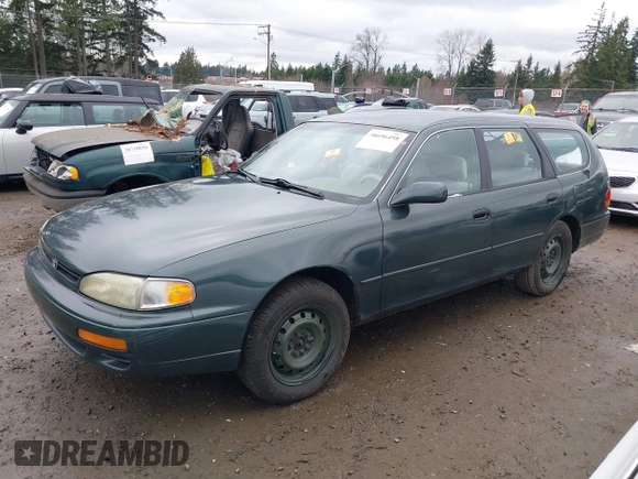 1996 Toyota Camry LE z VIN 4T1EF12K9TU116427, wystawiony jako IAAI lot #38696498 z przebiegiem 242 599 mil mil oraz . Historia ofert i sprzedaży dostępna na DreamBid. Obrazek 16.