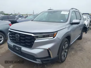 2023 Honda Pilot Touring with VIN 5FNYG2H75PB014662, listed as a IAAI auction lot 41889246 with 14,413 mi miles. Bid and sale history available at carsss.com. Image 17.