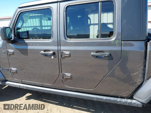 2023 Jeep Gladiator Sport S z VIN 1C6HJTAG2PL575276, wystawiony jako IAAI lot #42056473 z przebiegiem 17 043 mil mil oraz . Historia ofert i sprzedaży dostępna na DreamBid. Obrazek 14.
