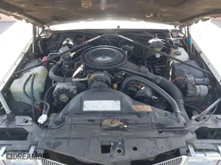1985 Cadillac Eldorado with VIN 1G6EL5786FE637155, listed as a IAAI auction lot 41855514 with 71,863 mi miles. Bid and sale history available at carsss.com. Image 10.