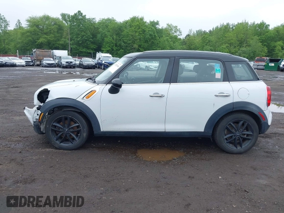 2013 MINI Countryman with VIN WMWZB3C53DWM08244, listed as a IAAI auction lot 42281364 with 139,894 mi miles and . Bid and sale history available at DreamBid. Image 14.